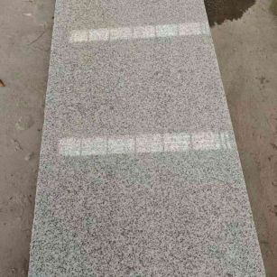 宁夏芝麻白光面毛板